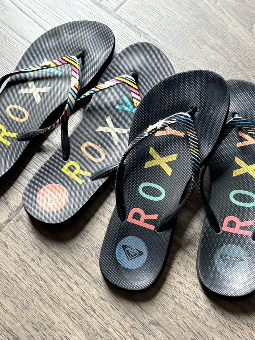 Roxy Black Flip Flops with Multicolor Logo and Striped Fabric Straps